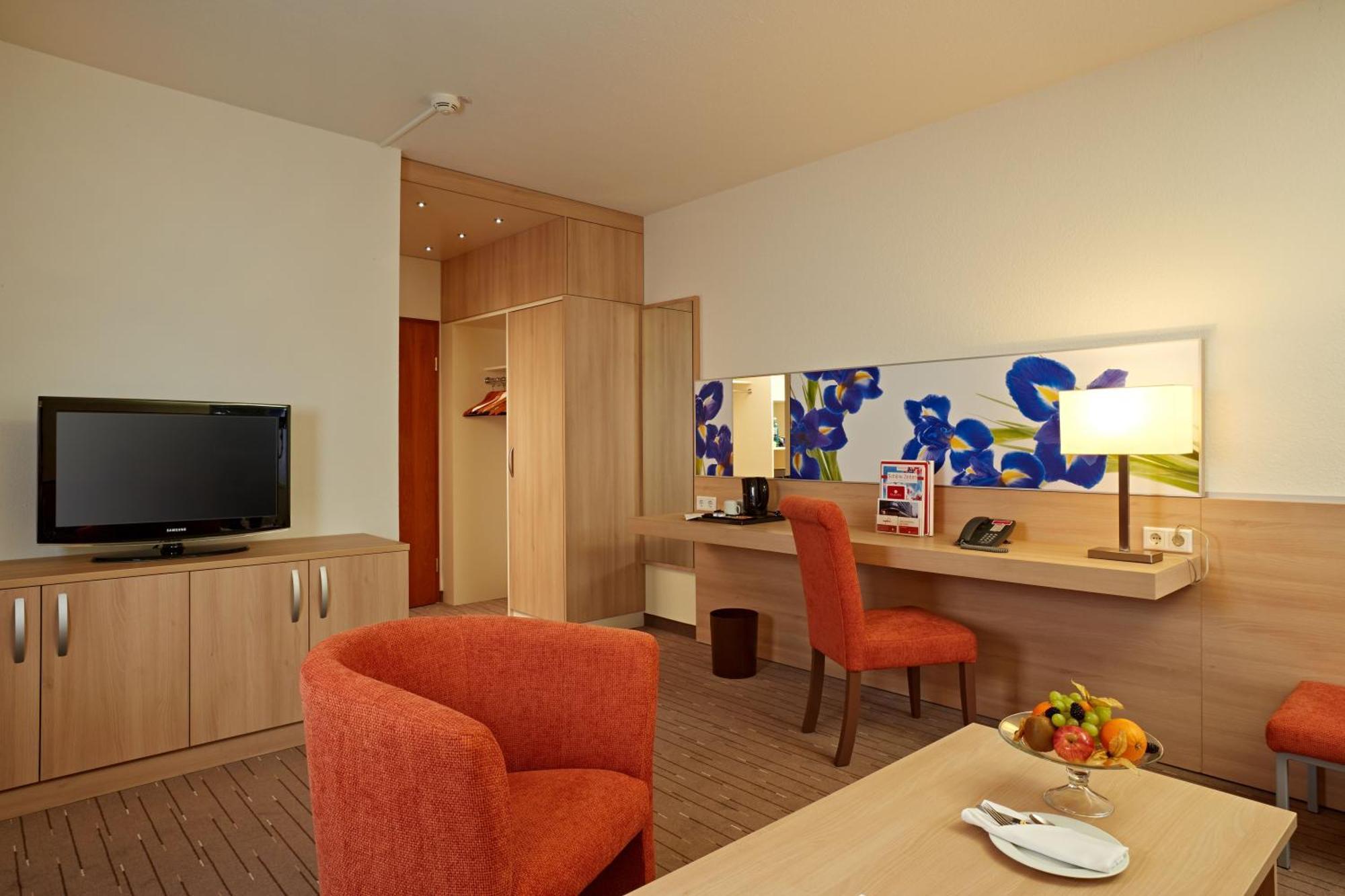 H+ Hotel Wiesbaden Niedernhausen Rom bilde