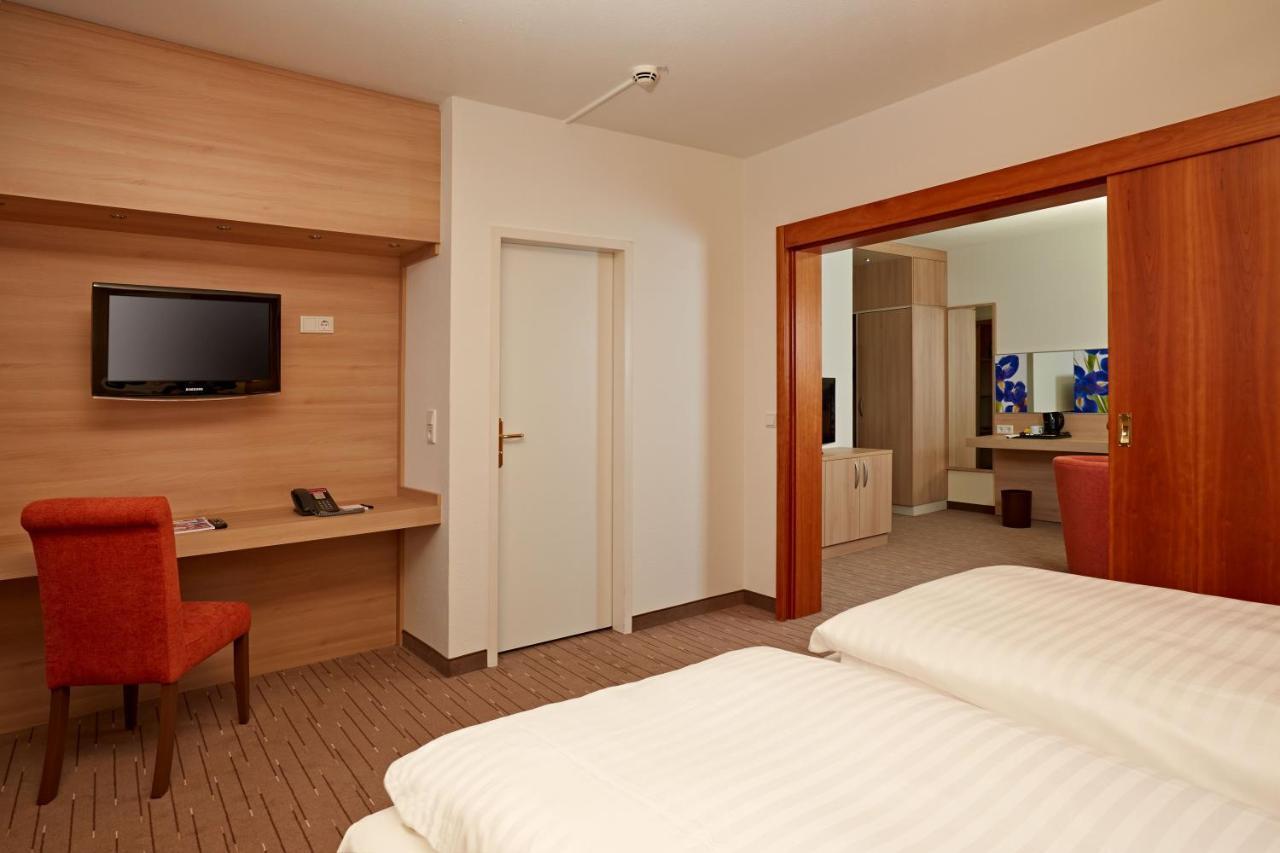 H+ Hotel Wiesbaden Niedernhausen Rom bilde