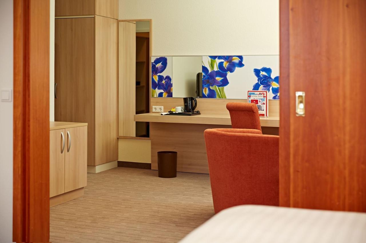 H+ Hotel Wiesbaden Niedernhausen Rom bilde